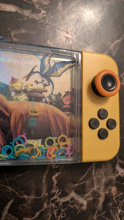 Dino World Handheld Water Ring Game Dinosaur Toy – Classic Push Button Game