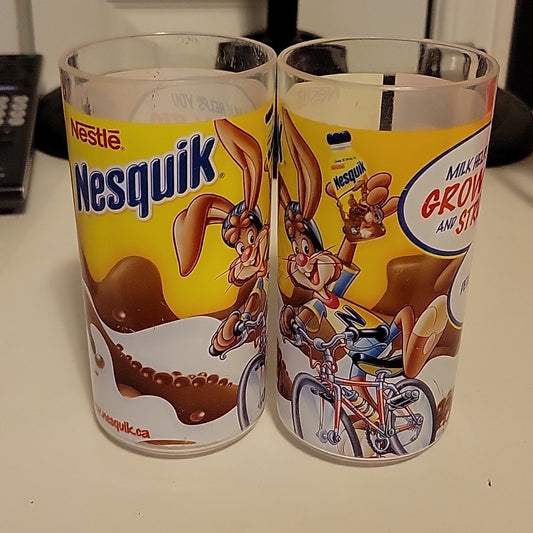 Lot Of 2 Vintage Nestle Nesquik Plastic Glasses Biking Rare Variant
