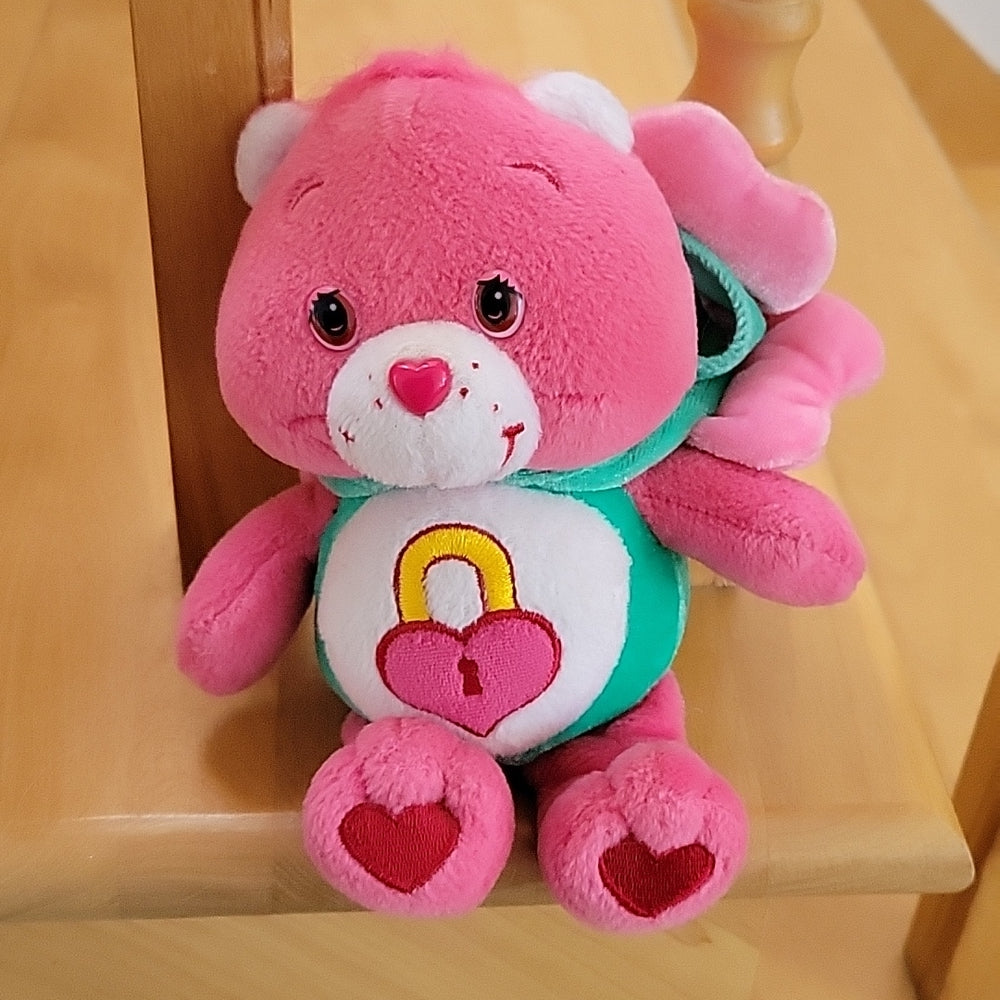 Pink care bear with heart lock online